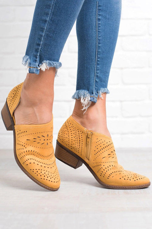 Botines occidentales con corte láser
